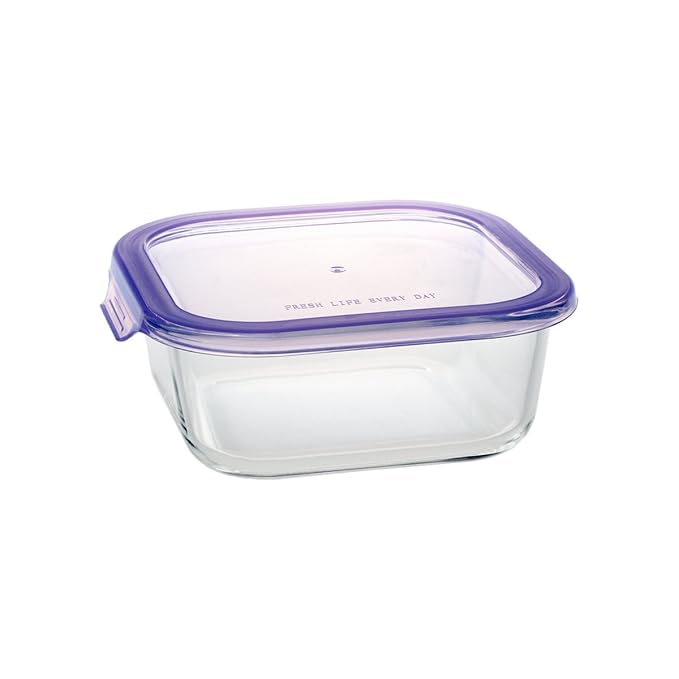 Clear glass food container with purple lid on a white background